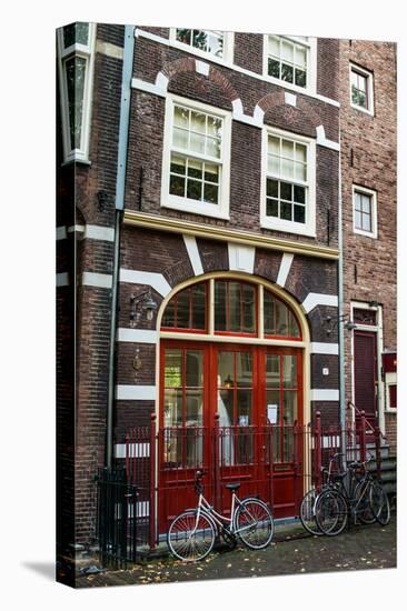 Red Door in Amsterdam-Erin Berzel-Stretched Canvas