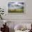 Red flowers and rainbow frame the green hills and farmland of Crete Senesi (Senese Clays), Province-Roberto Moiola-Framed Photographic Print displayed on a wall