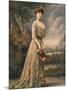 Red Haired Woman Modeling Pale Green, Gold Embroidered Robe Designed by Beer-Felix-Mounted Photographic Print