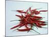 Red Hot Chillies on a White Sheet-Charcrit Boonsom-Mounted Photographic Print