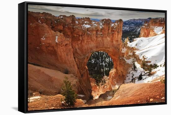 Red-Hued Limestone Arch Lit by Morning Sun with Snowy Cliffs in Winter at Natural Bridge-Eleanor Scriven-Framed Stretched Canvas