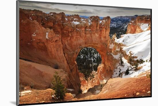 Red-Hued Limestone Arch Lit by Morning Sun with Snowy Cliffs in Winter at Natural Bridge-Eleanor Scriven-Mounted Photographic Print