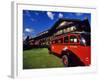 Red Jammer Buses Parked in Front of Glacier Park Lodge in East Glacier, Montana, USA-Chuck Haney-Framed Photographic Print