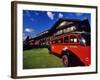 Red Jammer Buses Parked in Front of Glacier Park Lodge in East Glacier, Montana, USA-Chuck Haney-Framed Photographic Print