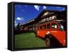 Red Jammer Buses Parked Outside of Glacier Park Lodge, Montana, USA-Chuck Haney-Framed Stretched Canvas