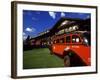 Red Jammer Buses Parked Outside of Glacier Park Lodge, Montana, USA-Chuck Haney-Framed Photographic Print