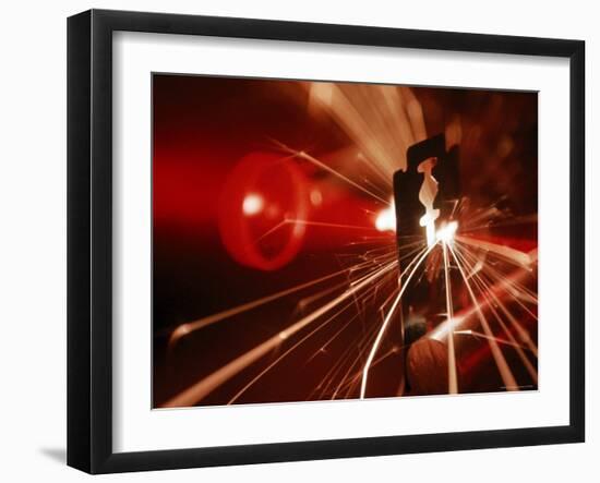 Red Laser Light Focused Through Lens Blasts Pin Point Hole Through Razor in Thousandth of a Second-Fritz Goro-Framed Photographic Print