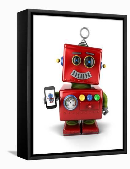 Red, Little Vintage Toy Robot with Smartphone, Smiling over White Background.-badboo-Framed Stretched Canvas