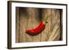 Red Pepper on Wooden Table, Yesemek, Gaziantep, Turkey-Ali Kabas-Framed Photographic Print