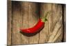 Red Pepper on Wooden Table, Yesemek, Gaziantep, Turkey-Ali Kabas-Mounted Photographic Print