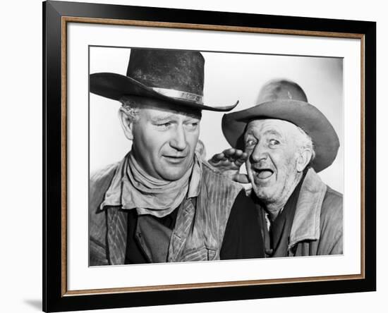 RED RIVER, 1948 directed by HOWARD HAWKS John Wayne and Walter Brennan (b/w photo)-null-Framed Photo