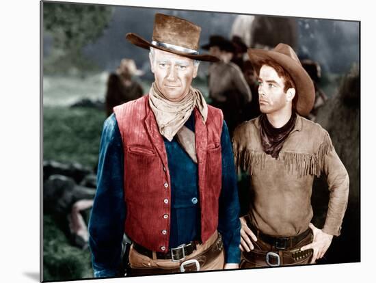RED RIVER, from left: John Wayne, Montgomery Clift, 1948-null-Mounted Photo
