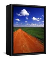 Red Road of Scoria near Fryburg, North Dakota, USA-Chuck Haney-Framed Stretched Canvas