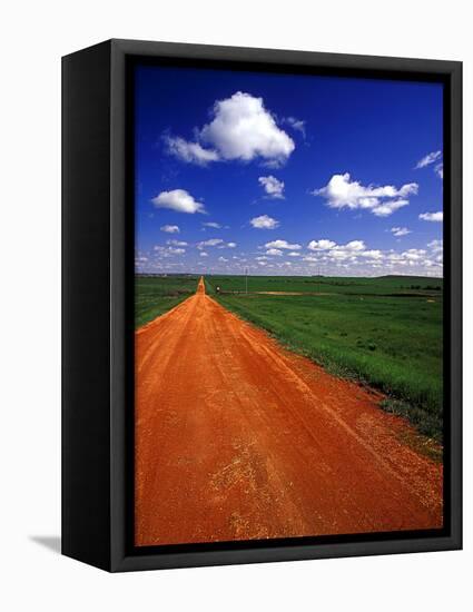 Red Road of Scoria near Fryburg, North Dakota, USA-Chuck Haney-Framed Stretched Canvas