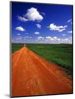 Red Road of Scoria near Fryburg, North Dakota, USA-Chuck Haney-Mounted Photographic Print
