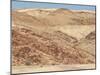 Red Rocky Landscape with Jeep in Distance, Purros Conservancy Wilderness, Kaokoland, Namibia-Kim Walker-Mounted Photographic Print