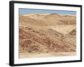 Red Rocky Landscape with Jeep in Distance, Purros Conservancy Wilderness, Kaokoland, Namibia-Kim Walker-Framed Photographic Print