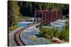 Red Rod Iron Railroad Bridge traverses Alaskan river, Alaska-null-Stretched Canvas