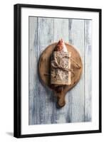 Red Snapper Wrapped in Chinese Newspaper on Wooden Background-Gary Jones-Framed Photographic Print