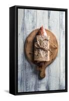 Red Snapper Wrapped in Chinese Newspaper on Wooden Background-Gary Jones-Framed Stretched Canvas