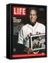 Red Sox Pitcher, Curt Schilling, Holding Photo of 2004 World Series Victory, December 17, 2004-John Huet-Framed Stretched Canvas