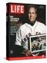 Red Sox Pitcher, Curt Schilling, Holding Photo of 2004 World Series Victory, December 17, 2004-John Huet-Stretched Canvas