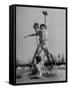 Red Sox's Player in Mid Air Catching the Ball, While an Opposing Player Slides Between His Legs-John Florea-Framed Stretched Canvas