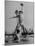 Red Sox's Player in Mid Air Catching the Ball, While an Opposing Player Slides Between His Legs-John Florea-Mounted Premium Photographic Print