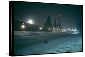 Red Star Atop Kremlin Tower Glowing Against Night-Dim Sky in Snow-Covered, Wintry Moscow, Ussr-Carl Mydans-Stretched Canvas