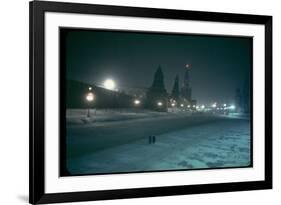 Red Star Atop Kremlin Tower Glowing Against Night-Dim Sky in Snow-Covered, Wintry Moscow, Ussr-Carl Mydans-Framed Photographic Print