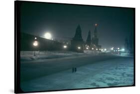 Red Star Atop Kremlin Tower Glowing Against Night-Dim Sky in Snow-Covered, Wintry Moscow, Ussr-Carl Mydans-Stretched Canvas