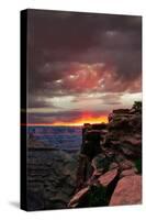 Red sunset with moody clouds and red rock canyons in Dead Horse Point State Park near Moab, Utah-David Chang-Stretched Canvas