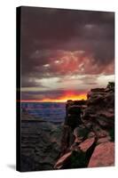 Red sunset with moody clouds and red rock canyons in Dead Horse Point State Park near Moab, Utah-David Chang-Stretched Canvas