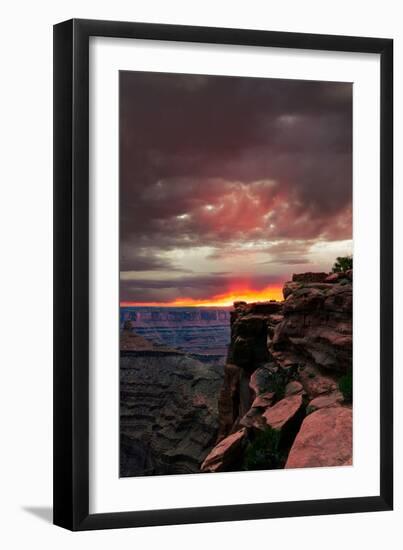 Red sunset with moody clouds and red rock canyons in Dead Horse Point State Park near Moab, Utah-David Chang-Framed Premium Photographic Print