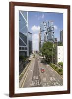 Red taxi cab in Central, Hong Kong Island, with the Bank of China Tower and Lippo Centre beyond, Ho-Fraser Hall-Framed Photographic Print