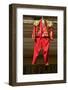 Red toreador bull fighting outfit for boy hangs in Centro old district of Sevilla Spain-null-Framed Photographic Print