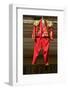 Red toreador bull fighting outfit for boy hangs in Centro old district of Sevilla Spain-null-Framed Photographic Print