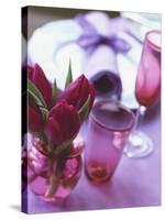 Red Tulips in Small Vase Beside Place Setting-Michael Paul-Stretched Canvas