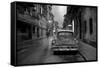 Red Vintage American Car Parked on a Floodlit Street in Havana Centro at Night-Lee Frost-Framed Stretched Canvas