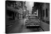 Red Vintage American Car Parked on a Floodlit Street in Havana Centro at Night-Lee Frost-Stretched Canvas