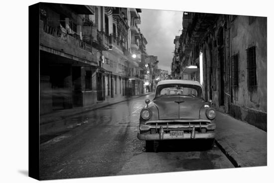Red Vintage American Car Parked on a Floodlit Street in Havana Centro at Night-Lee Frost-Stretched Canvas