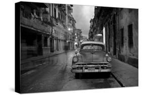 Red Vintage American Car Parked on a Floodlit Street in Havana Centro at Night-Lee Frost-Stretched Canvas