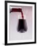 Red Wine bottle pouring into a glass-null-Framed Photographic Print