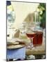 Red Wine in Glass and Carafe, Schüttelbrot Beside (S. Tyrol)-Eising Studio - Food Photo and Video-Mounted Photographic Print