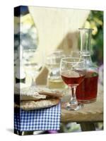 Red Wine in Glass and Carafe, Schüttelbrot Beside (S. Tyrol)-Eising Studio - Food Photo and Video-Stretched Canvas