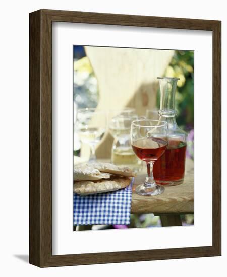 Red Wine in Glass and Carafe, Schüttelbrot Beside (S. Tyrol)-Eising Studio - Food Photo and Video-Framed Photographic Print