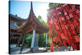 Red Wooden Traditional Chinese Good Luck Charms and Pagoda in Background, Hangzhou, Zhejiang, China-Andreas Brandl-Stretched Canvas