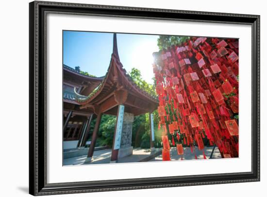 Red Wooden Traditional Chinese Good Luck Charms and Pagoda in Background, Hangzhou, Zhejiang, China-Andreas Brandl-Framed Photographic Print