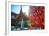 Red Wooden Traditional Chinese Good Luck Charms and Pagoda in Background, Hangzhou, Zhejiang, China-Andreas Brandl-Framed Photographic Print