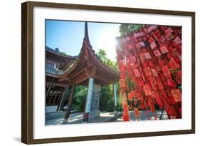 Red Wooden Traditional Chinese Good Luck Charms and Pagoda in Background, Hangzhou, Zhejiang, China-Andreas Brandl-Framed Photographic Print